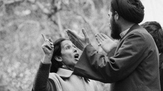 Iranian woman speaking back to a man