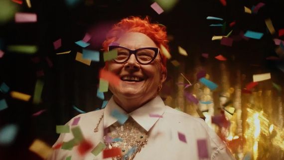 confetti falling around a smiling person