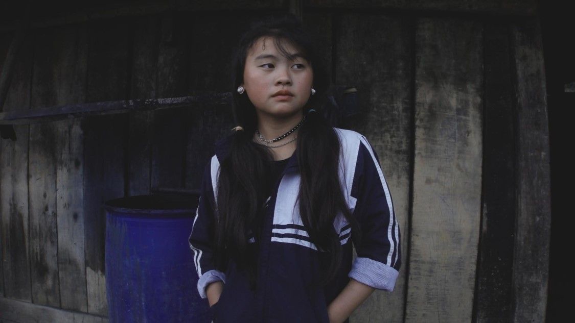 a child looking off into the distance