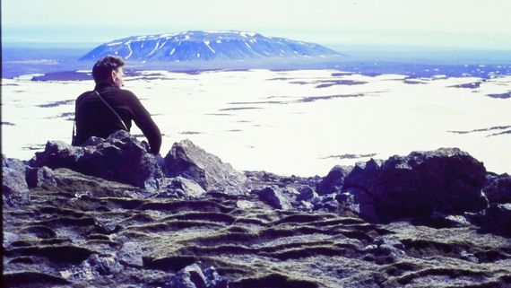 Man looking out at glacier