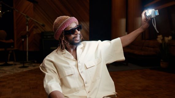 Lil Jon talking selfie with digital camera