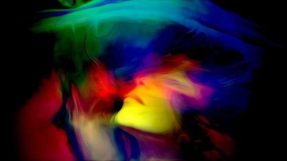 colourful lights flowing over a womans face