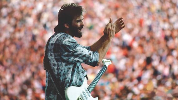 Kenny Loggins on stage in front of crowd