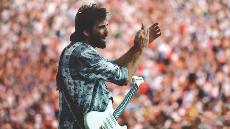 Kenny Loggins on stage in front of crowd
