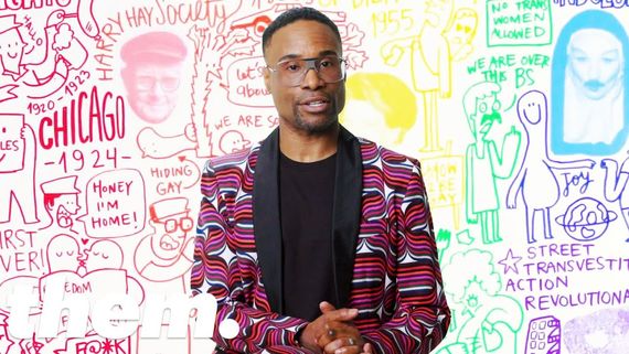 Billy Porter standing infront of a rainbow collage of doodles