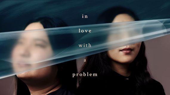 in love with a problem over two teens faces blurred out by a beam of plastic