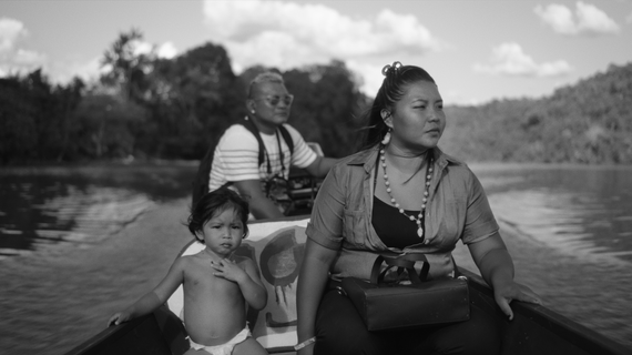 Two woman and small child on boat