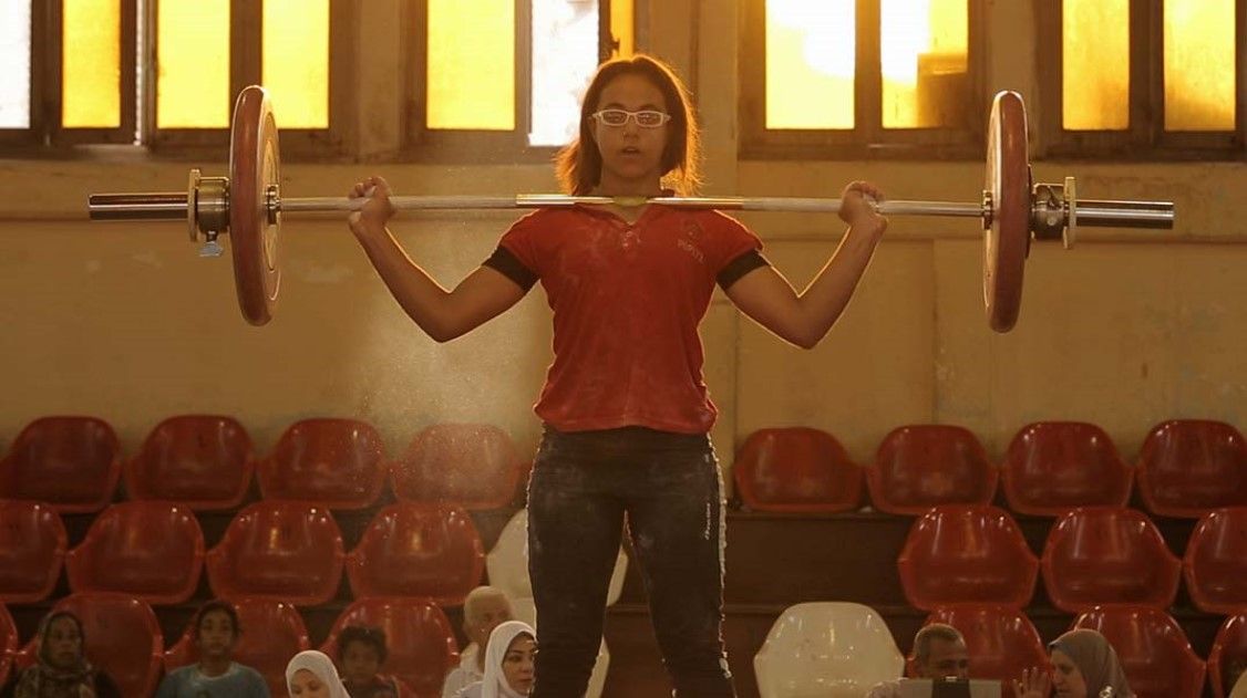 woman weight lifting