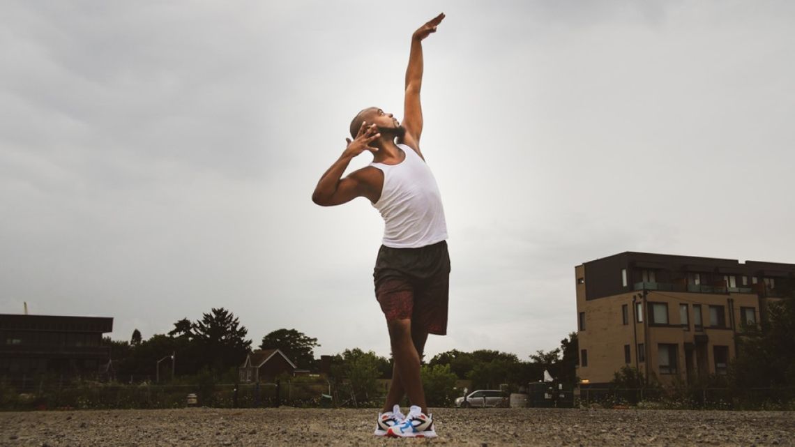 a man striking a dance pose