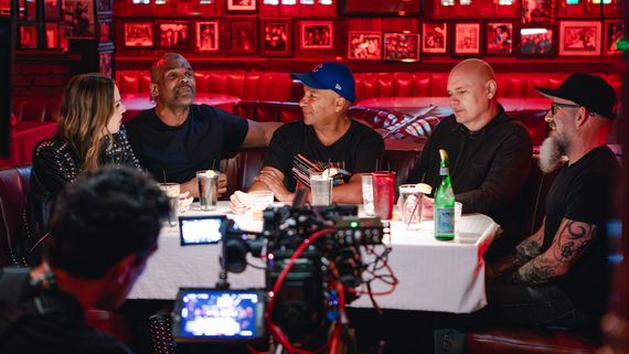Men sitting at a restaurant table