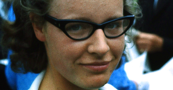 a close up of a young woman